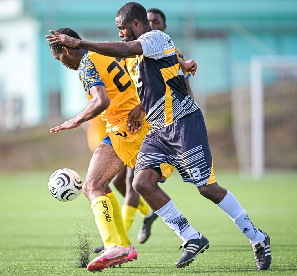 Middleham United FC player Kimon Jno Baptiste attempting to win the ball from a Dublanc FC player