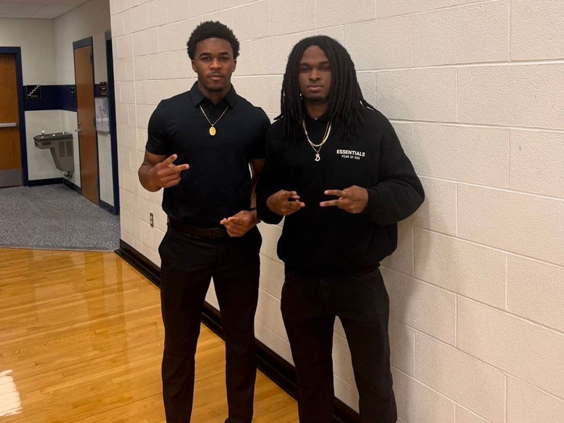 Malachai Bonney posing for a picture with Derwin Eusebe