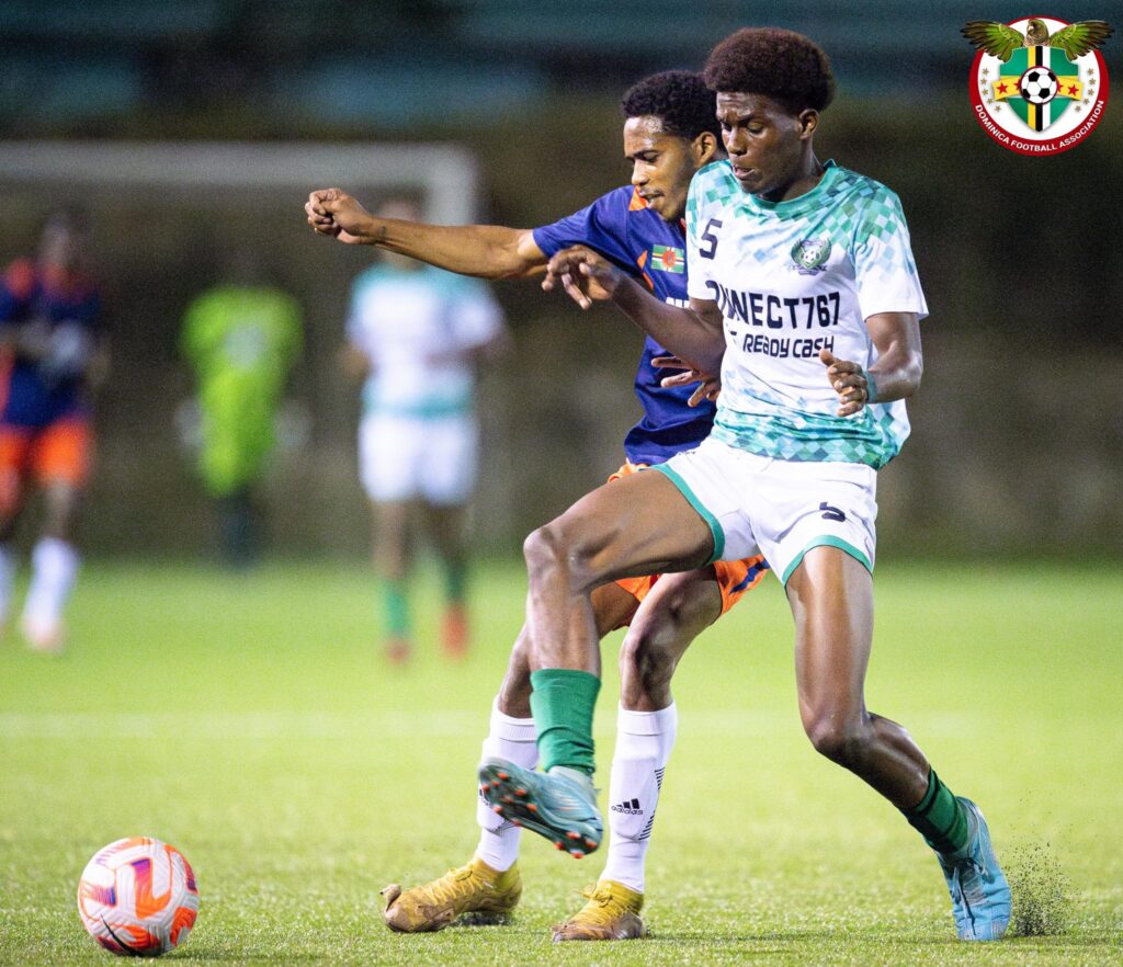 Marcelus battling for the ball in the middle of the field