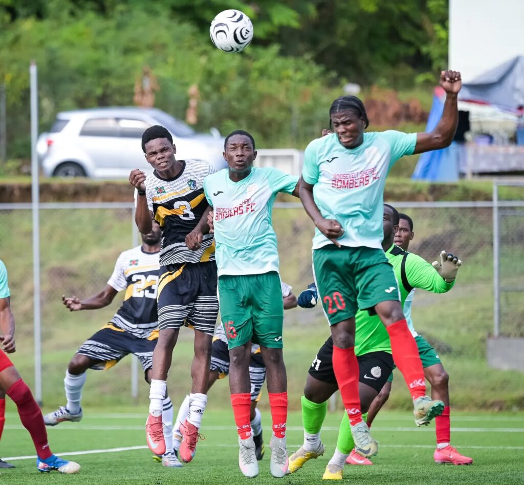 A ball being contested by players on both teams
