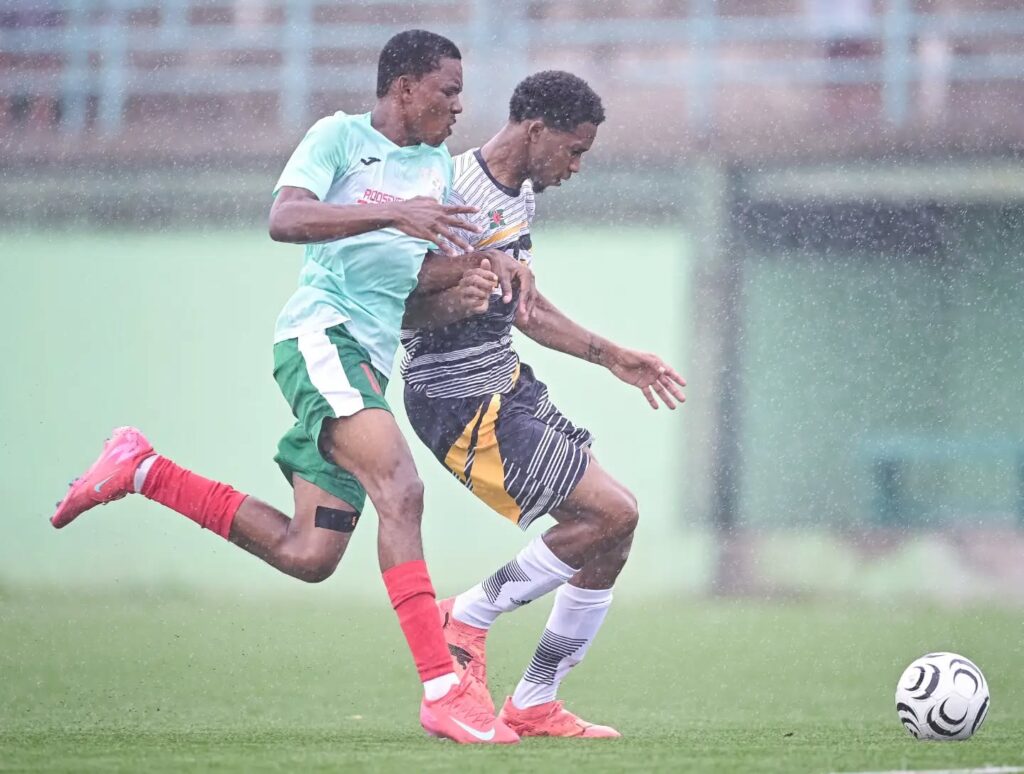 Middleham United FC player Marcellus Bonney shielding the ball from an opponent