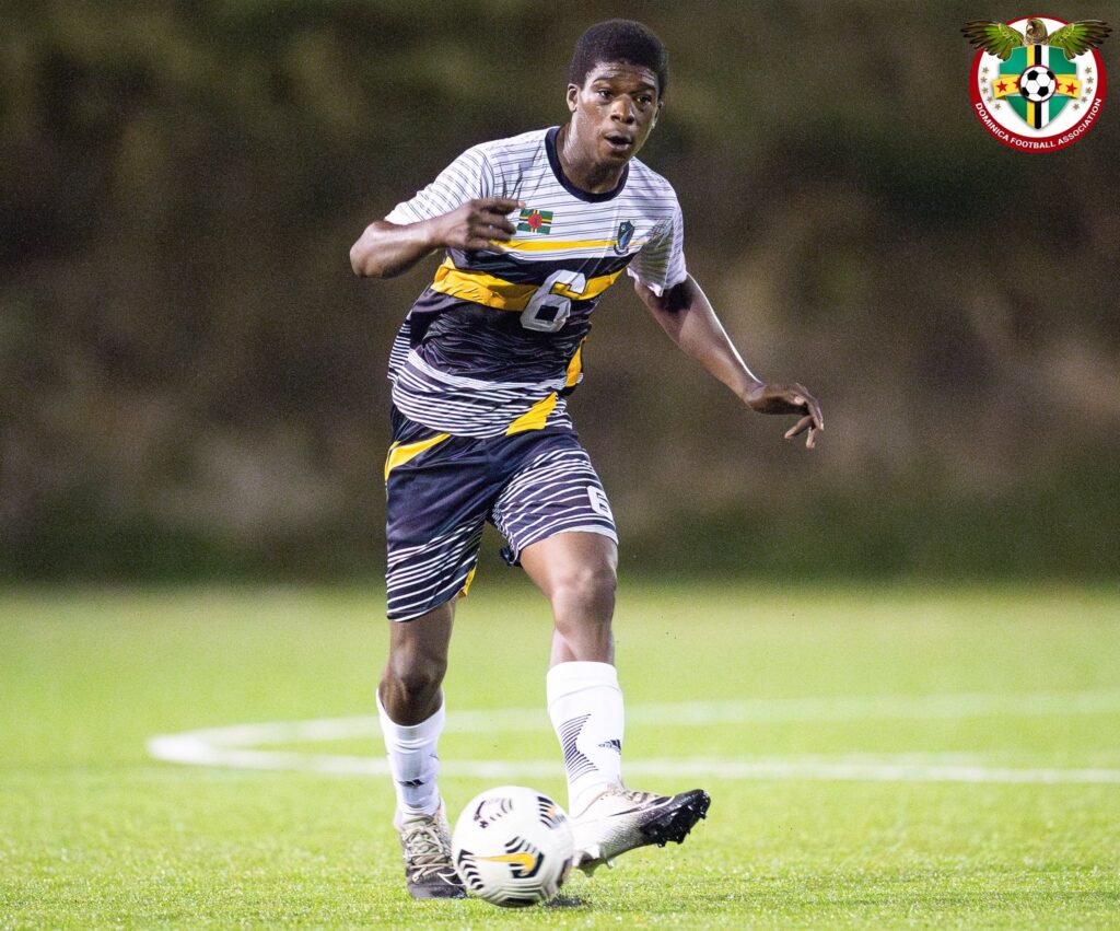 Fitzroy Benjamin passing the ball to a teammate