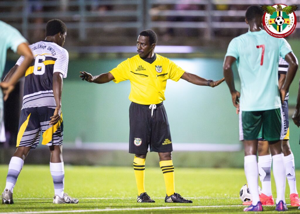 The referee taking control of the game