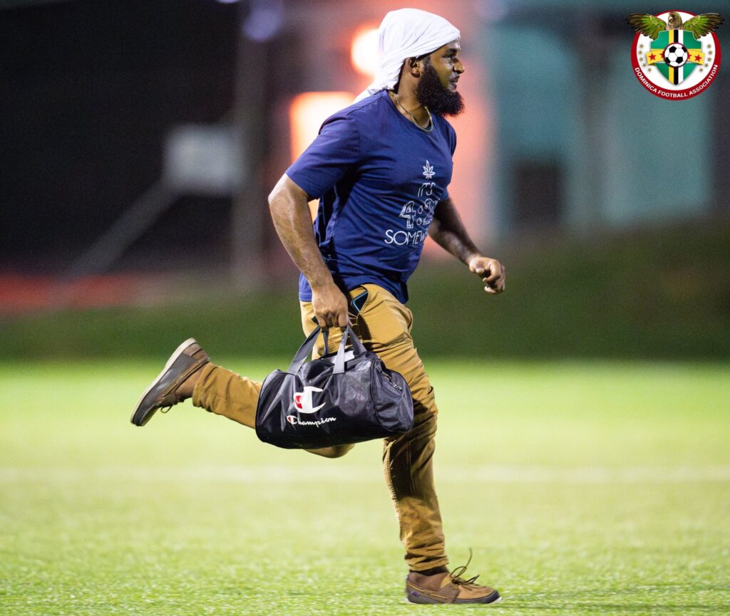 Middleham United FC medic Chad Lucien running onto the field