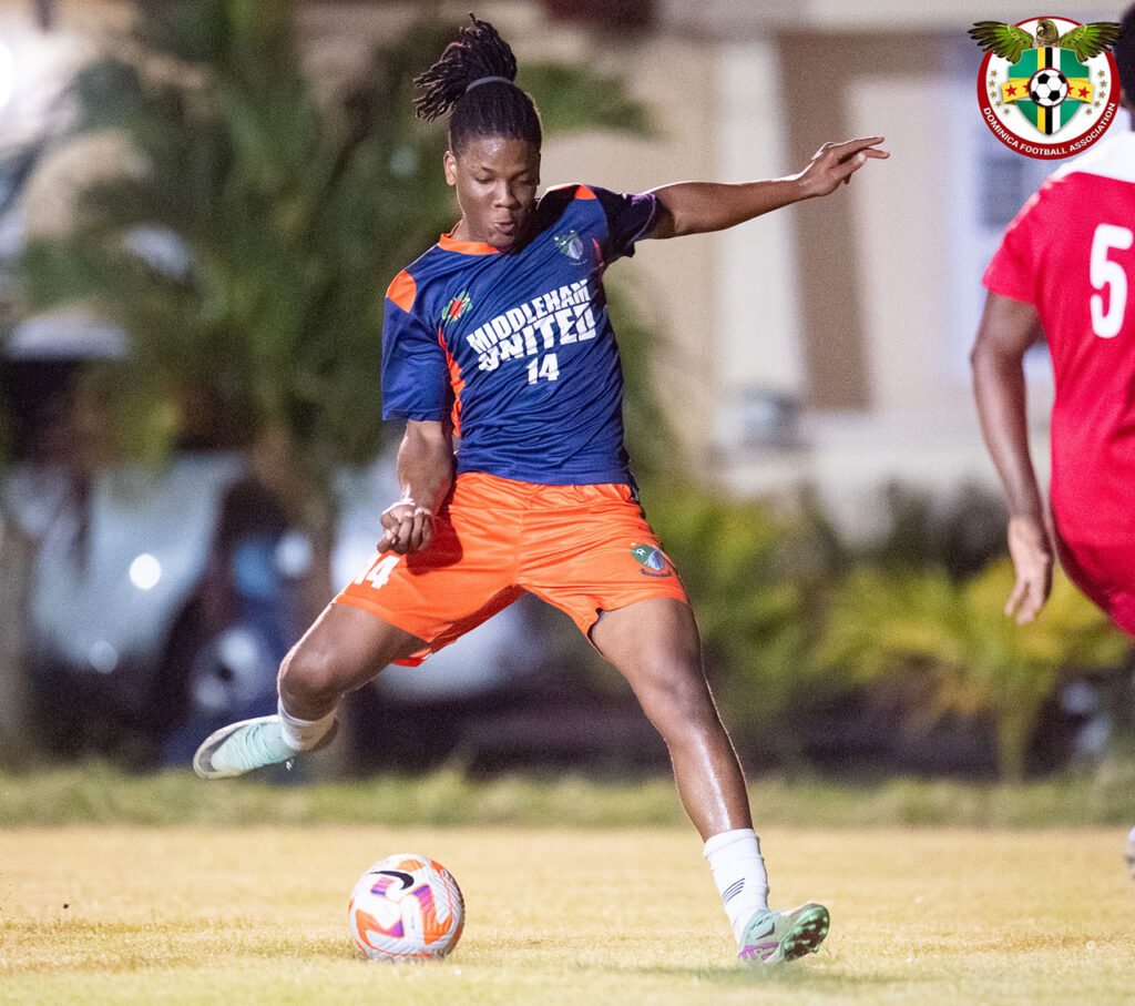 Middleham United FC player Jervon Matthew about to pass the ball