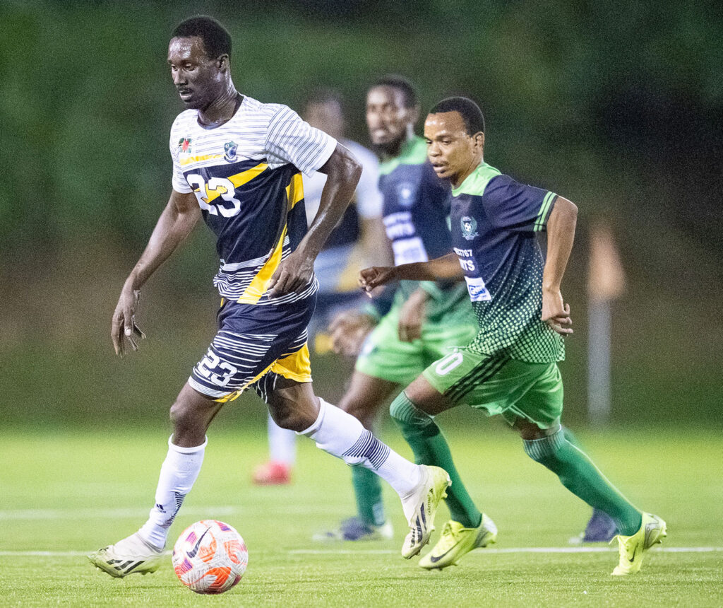 Middleham United FC player Shakeem Gregoire dribbling the ball